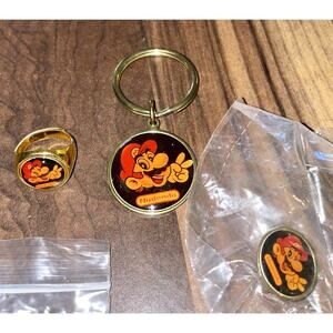 Super Mario Bros. Nintendo NES/SNES Era Mario Ring, Keychain, and Pin Set
